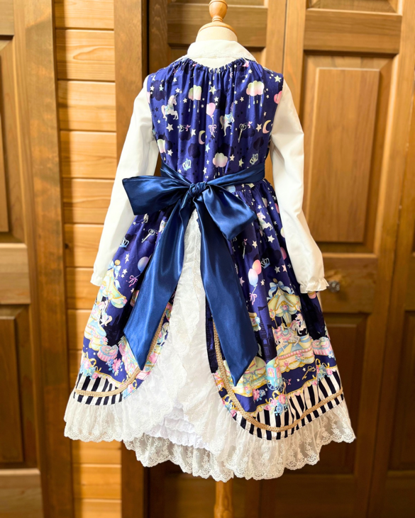 後には大きなリボン