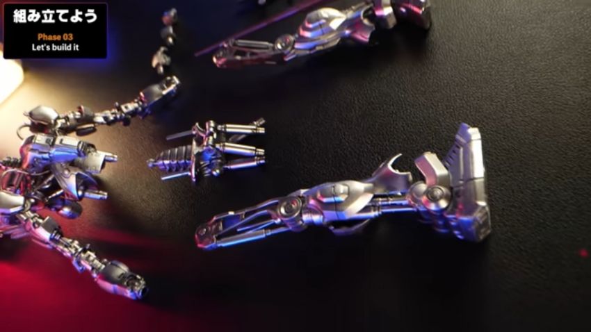 塗装されたガンダムEXとT-800の部品