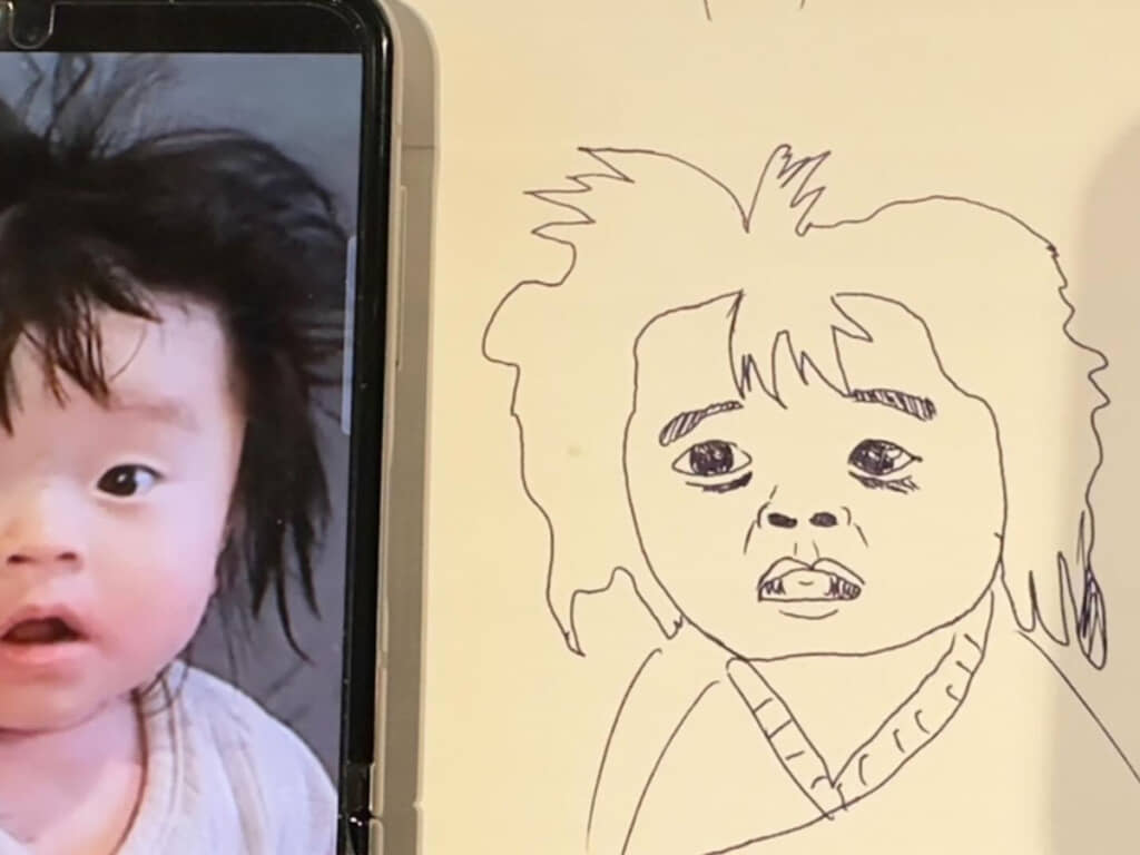 パパの作画。陰影をきちんと描いたせいで、目にクマが……