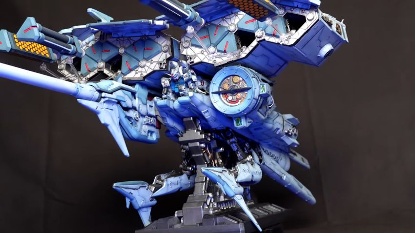 コンテナからミサイルを発射し、クローアームを展開したデンドロビウム