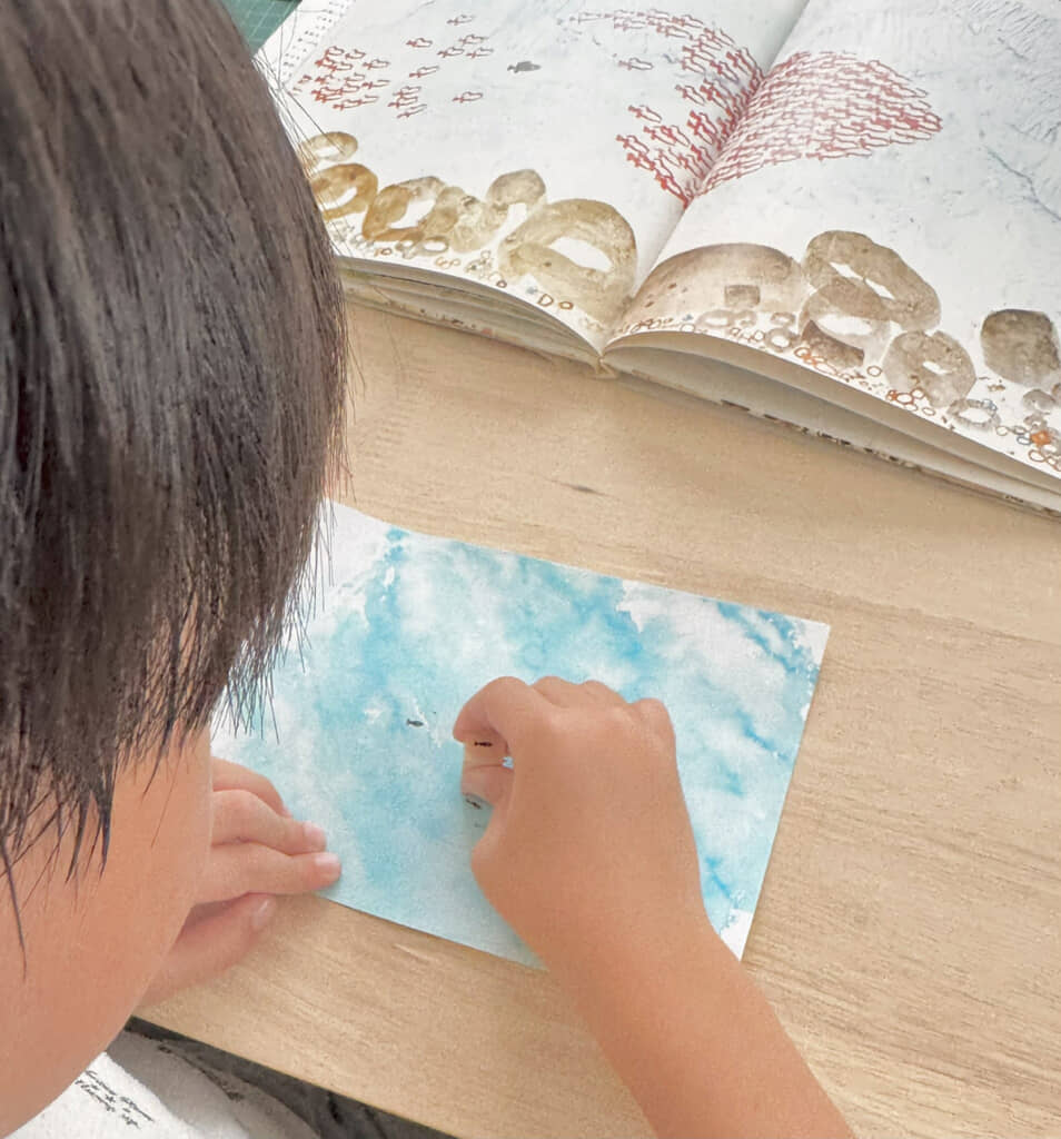 魚のスタンプを購入して……