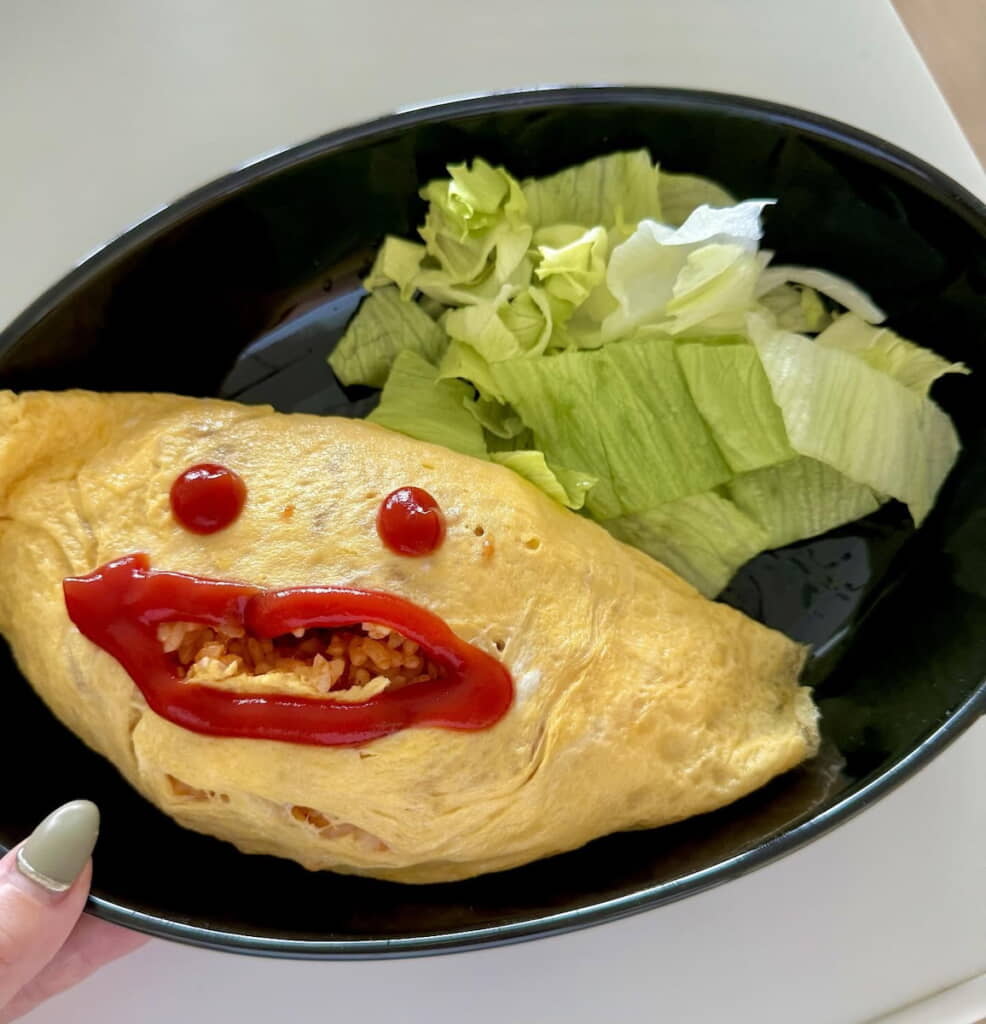 何か言いたい感じの顔