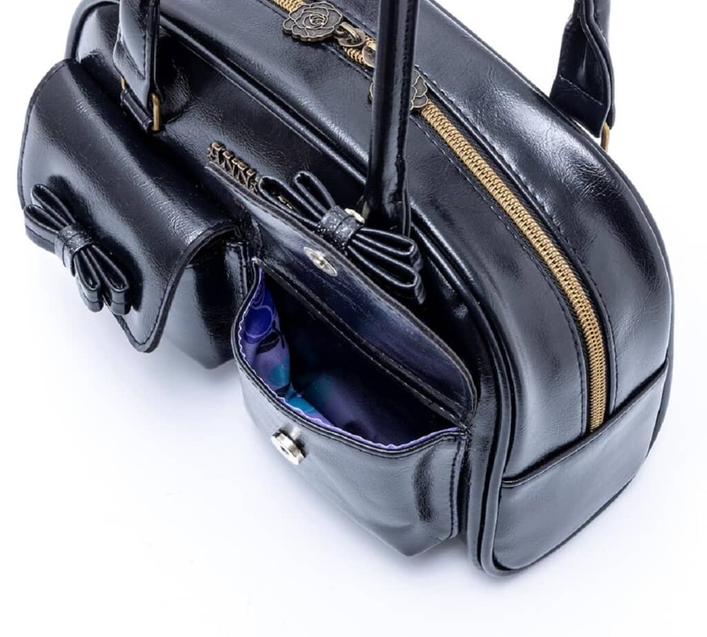 バラのファスナートップにポケットにはダブルリボン