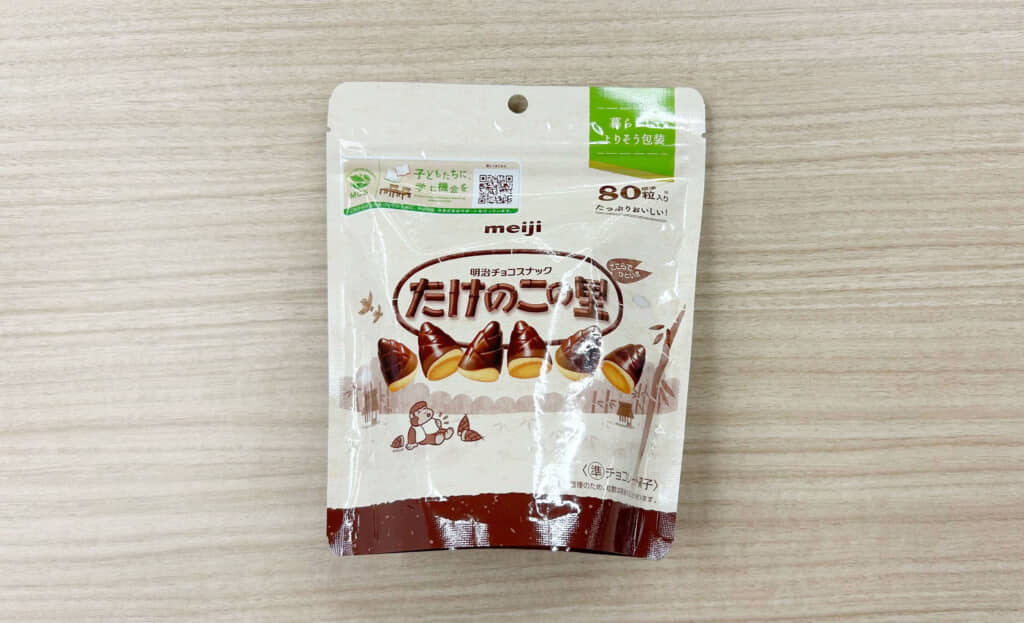 明治「たけのこの里シンプル包装大容量パウチ 188g」のパッケージ表面