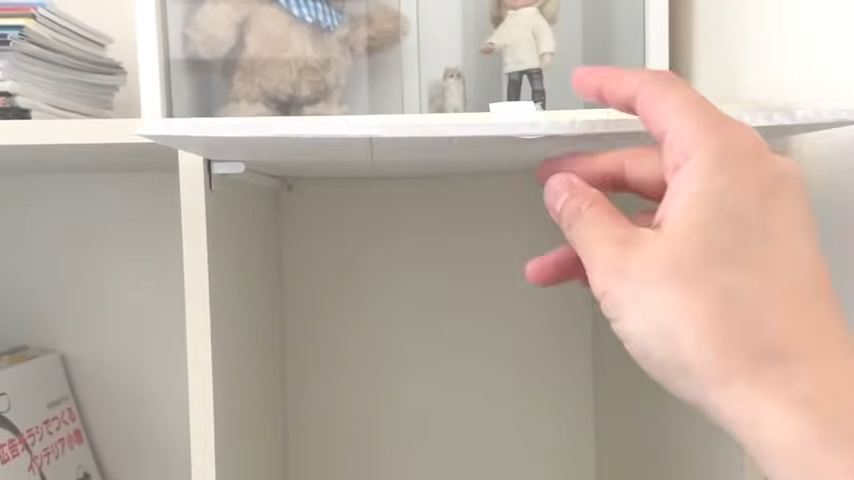 持ち上げた扉がレールに収納される