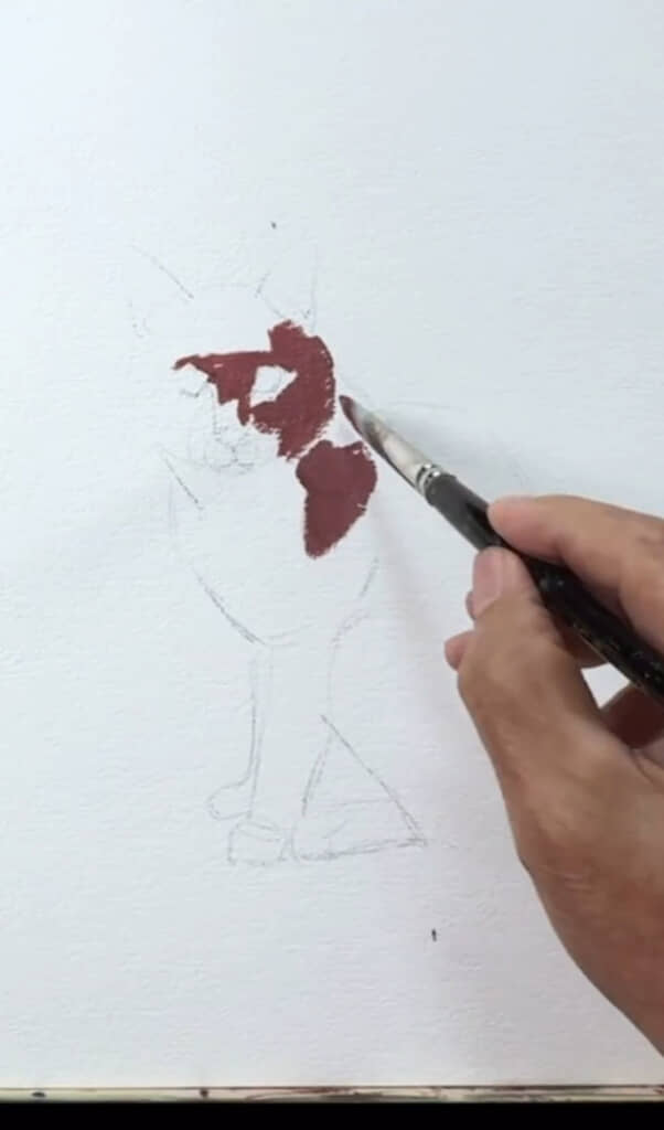 日陰の部分から塗り始める柴崎さん