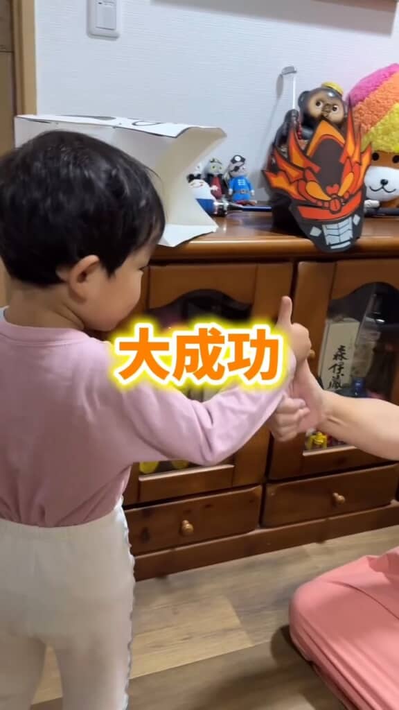 成功を祝う息子さん