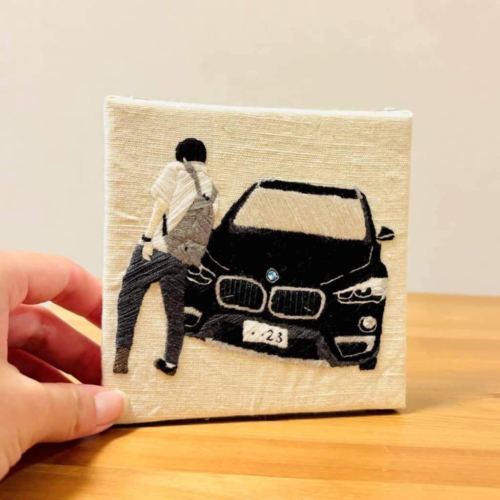 写真が再現されている刺しゅう作品