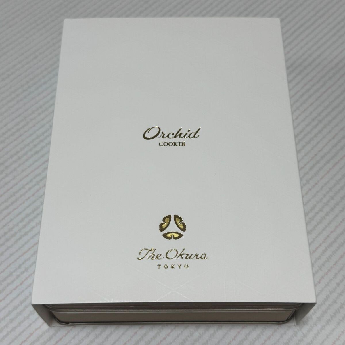 ホテルオークラで、ちょっと高いクッキー缶を購入→ふたを開けたら……　「はえ～」まさかの中身が92万表示 | ライフスタイル ねとらぼ