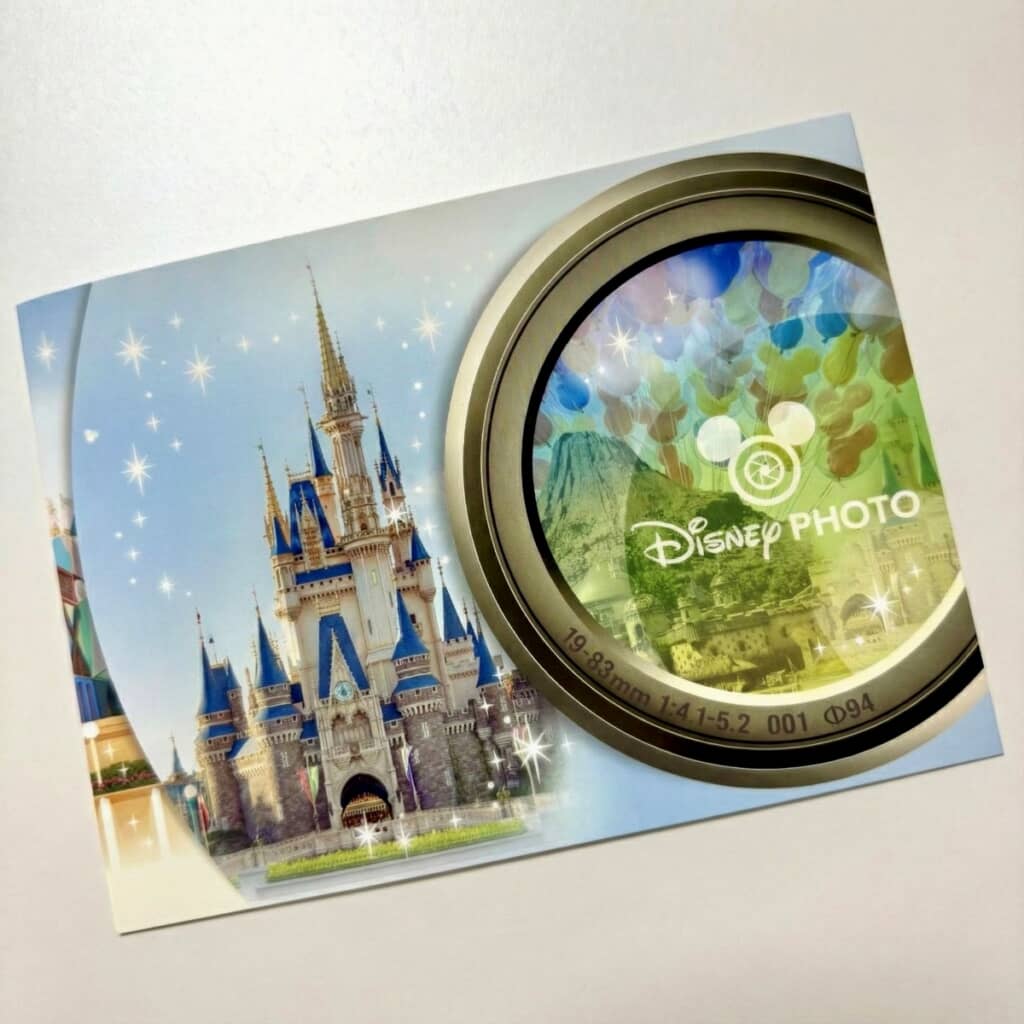 シンデレラ城とカメラのレンズが描かれた写真台紙