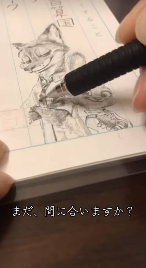 キツネ風キャラの服装部分を描き込む手元