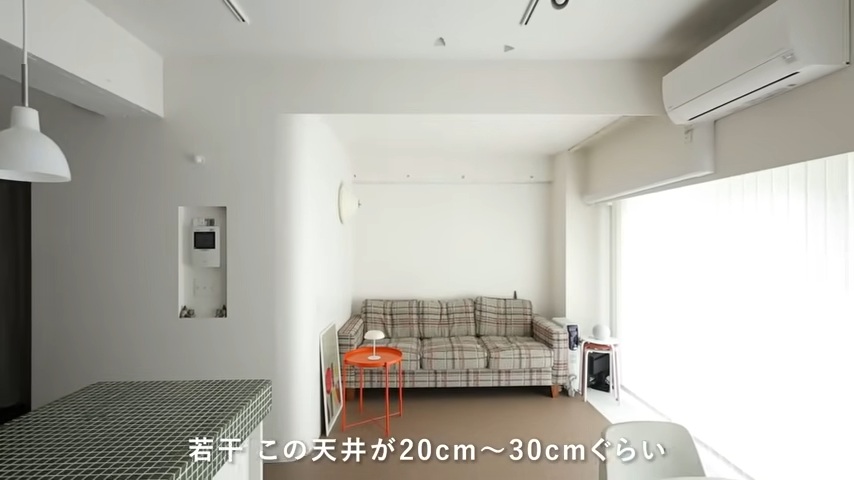 カーテンで仕切ればゲストルームにもなるリビング