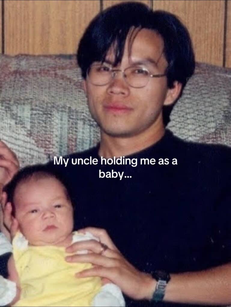 赤ちゃんのころ、おじに抱っこされていた写真