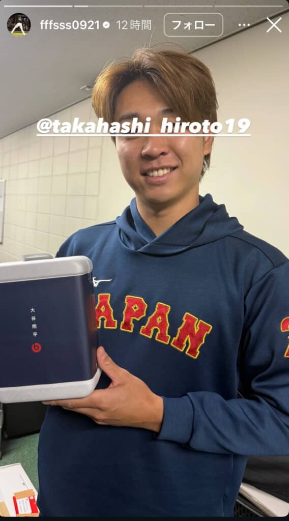 箱を持つ高橋選手