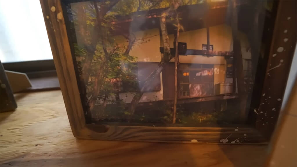 玄関には初期の別荘を写した写真が