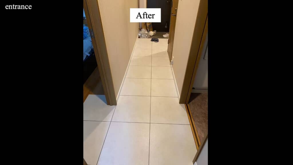 白いフロアタイルが敷き詰められた廊下