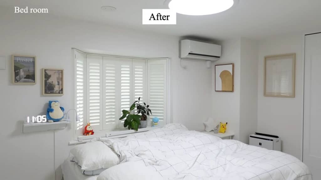 出窓にウッドシャッターを追加し各部の色を白に変更した寝室