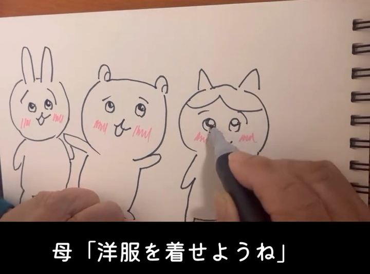 瞳を入れて完成……と思いきや、「洋服を着せようね」