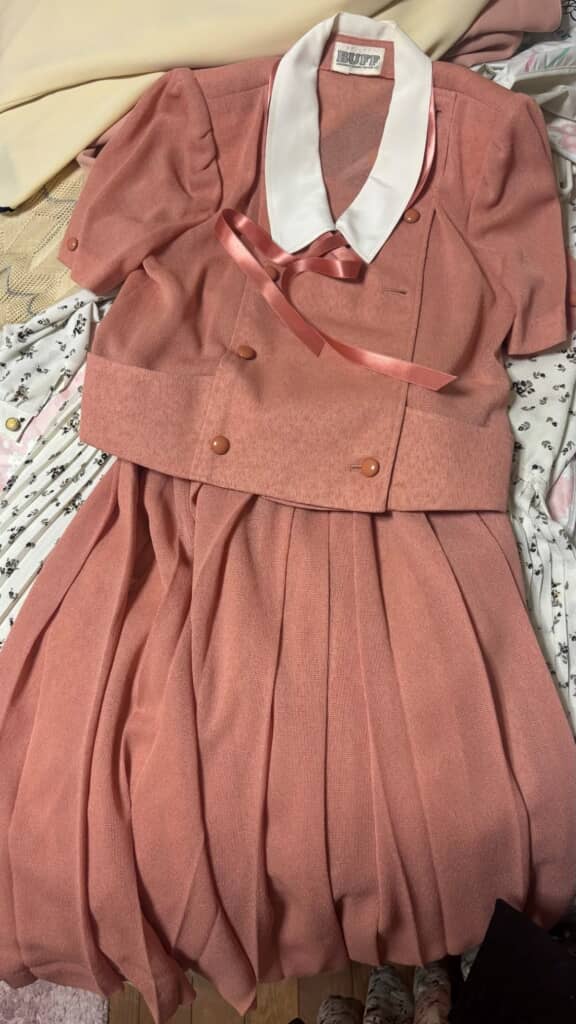 ピンク色のダブルジャケット
