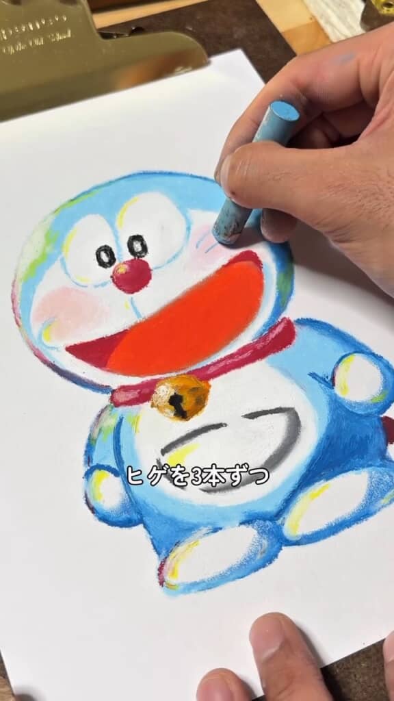 ヒゲは水色で3本ずつ描く