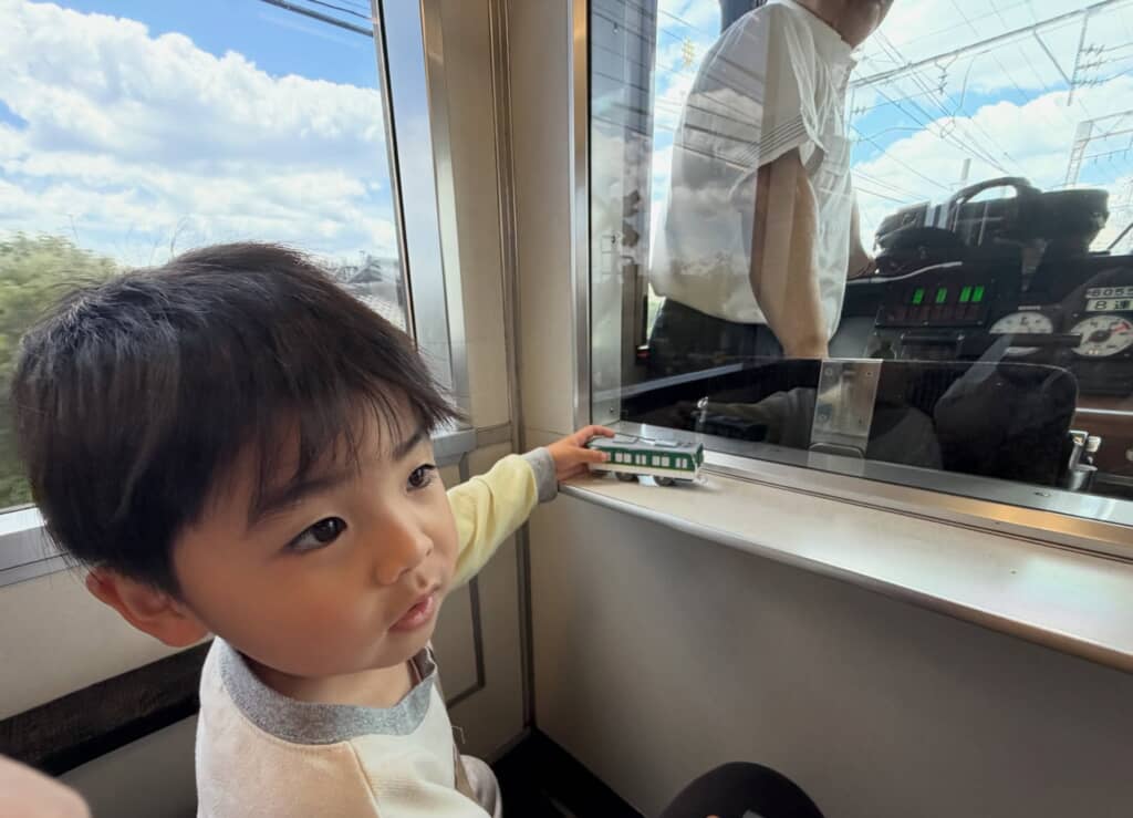 あれ？　電車に乗っている？