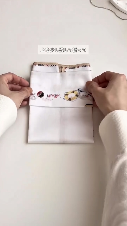 上の部分を少し残して折る