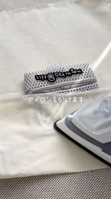 大きいワッペンから順に当て布をしてアイロンをかける