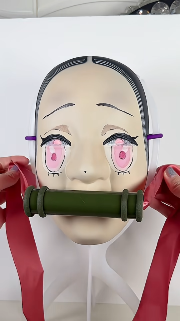 竹筒を口元に装着