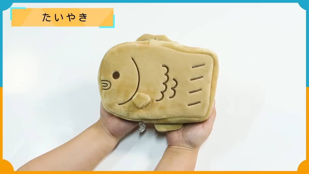 とぼけた表情のたいやきバッグ