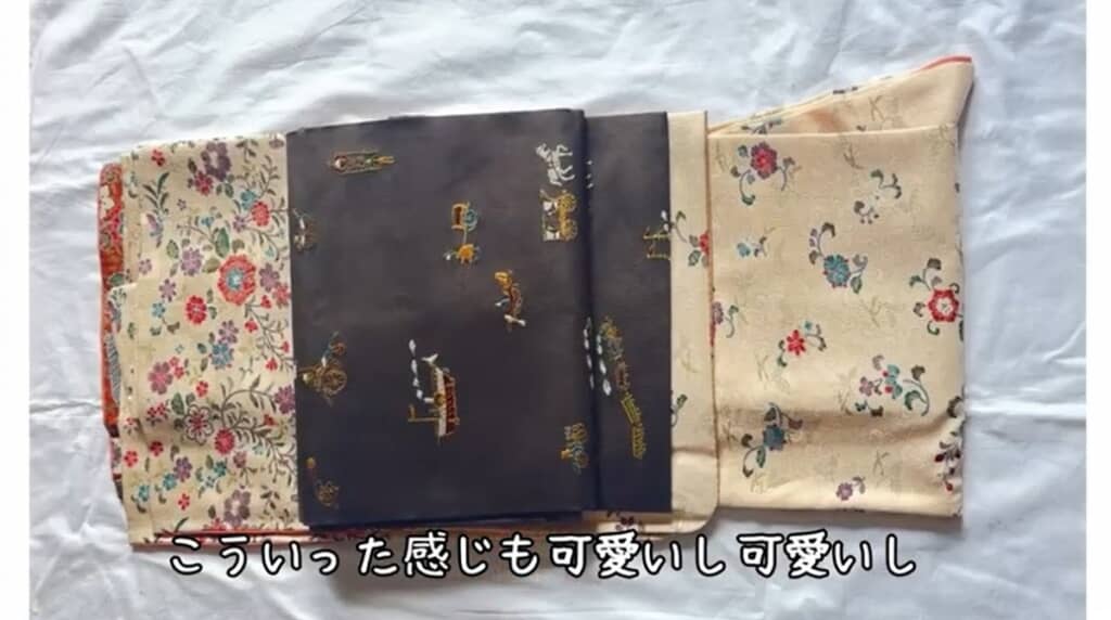 文明開化の様子が描かれた名古屋帯